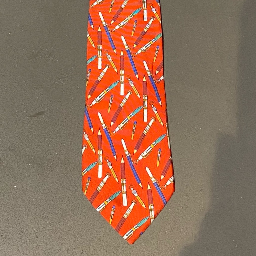 Gucci tie with technical pen design.